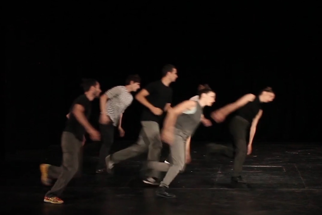 Group dancing energetically on stage